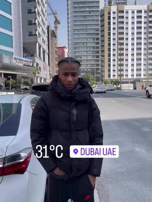 A post by @drilltimetv on TikTok caption: Trapstar coat in 31 degree heat should be illegal😭😅 #fyp #ukdrill #clavish #ukrap #drill #rap #trapstar #uk #dubai 