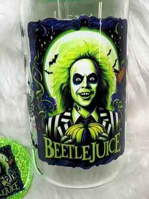 A post by @terriestumblers on TikTok caption: Beetlejuice 2 is almost here 1 more month 🥳 cant wait !!!! #beetlejuice #uvdtf #uvdtfprinter #libbyglasscan #keychain #processvideo 