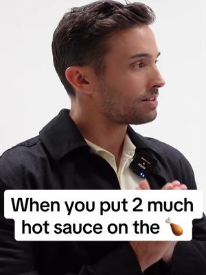 A post by @jrandofficial on TikTok caption: I did not mean to put that much hot sauce on that wing for @Ada Vox i am a heifer! #funnyinterview #hotones #hotsaucechallenge #hotsauce #funnyy #spicychicken 