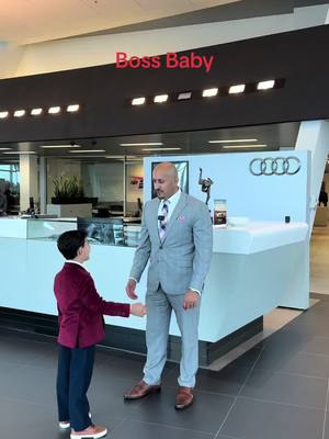 A post by @audimilwaukee on TikTok caption: Boss baby picking out a car of his choice!!! #audi #fypage #fire #loveyou #funny #boss 