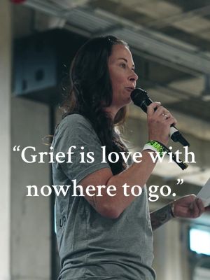 A post by @crossfitgames on TikTok caption: “Grief is love with nowhere to go.”  Sara Wilkinson — wife of the late Navy SEAL Chad Wilkinson, CF-L4 coach, and president of The Step Up Foundation — spoke with athletes before Individual Event 5 about loss, processing grief, and the meaning of tribute workouts.  At the 2024 CrossFit Games, individual athletes took on a version of CrossFit Hero workout CHAD1000X.  #CrossFit #CrossFitGames #Sports