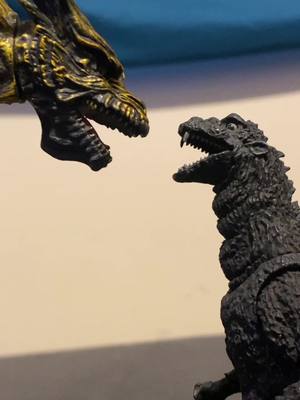 A post by @spawnjr54 on TikTok caption: Gramps became a handful today while FW is on Vacation #godzilla #godzillakingofmonsters #godzillafigures #shmonsterarts #hiyagodzilla #godzilla1954 #keizerghidorah #godzillafunny #godzillanation #kaijukingdom #kaijuparadise #kaijugroupie 