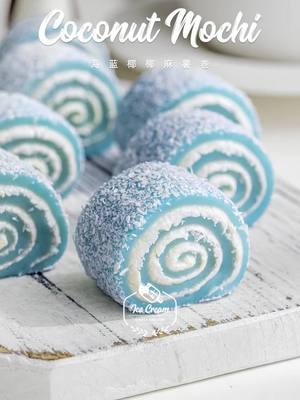 A post by @foodievoyager08 on TikTok caption: Coconut Mochi🥥🍰 Rolls Coconut flavored mochi rolls, soft and glutinous, easy to make~👍 ✨Ingredients: Butterfly pea flowers, 250g milk, 170g glutinous rice flour, 30g corn starch, 40g sugar, 15g butter 200g cream cheese, 25g sugar, 60g coconut milk, shredded coconut #simplechoices #mochisquishy #mochifilledcookies #makingchili #Lemon8Diary #dessert #dessertideas 