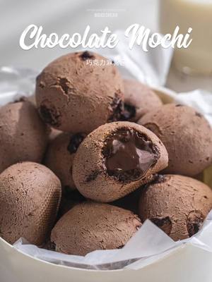 A post by @foodievoyager08 on TikTok caption: Chocolate Mochi Balls🍫🍪 A must-make pop-up mochi ball for a chocolate head...it's so delicious and not complicated.😋 ✨Ingredients: 1 egg, 80g milk, 1g salt, 200g mochi powder, 5g cocoa powder, 40g butter, 100g dark chocolate, 100g light cream After the milk and eggs are mixed, they can be slightly heated to 40 degrees for better expansion effect. If you knead by hand, be sure to knead the dough until it is smooth, imitating the action of rubbing clothes, about 10 minutes. Remember to spray water on the surface. The baking temperature depends on your actual situation. Use a baking mat to prevent the bottom from becoming concave. #dessert #cakes #ChocolateVille#chocolate chip cookies#cakeideas #Mochi 