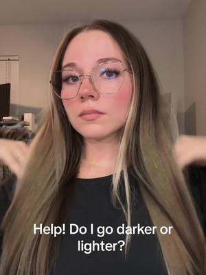 A post by @mlayne134 on TikTok caption: I’ve been growing my hair out back to my natural color but am now tempted to go darker or lighter again 😭 #hairfilter #brunette #blonde #help #fyp 