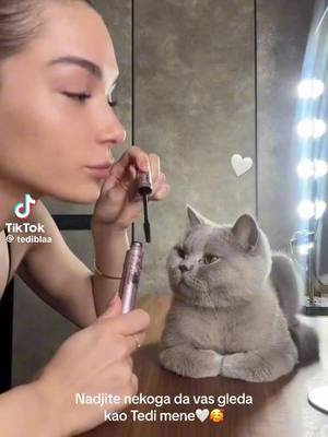 A post by @khokhaina1 on TikTok caption: #Cute Freckles With Lshes #cat 