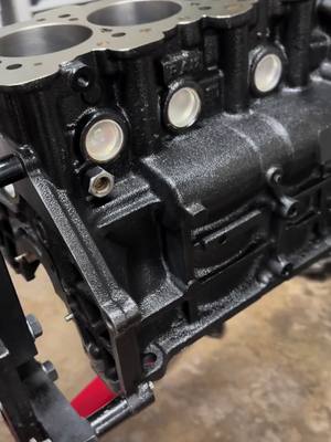 A post by @thedsmlife on TikTok caption: Primed, Painted and Freeze Plugs Installed #painting #dsm #boosted #DIY #awd #eclipse #gsx #mitsubishi #engine #4g63 