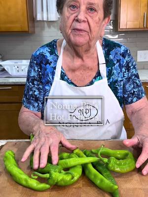 A post by @nonnapiaa on TikTok caption: Nonna Pia Fries up her Delicious Hot Peppers 🌶️ 👵❤️ #nonnapia #hotpeppers #MadeWithLove #italiancooking #oldschoolitalian 