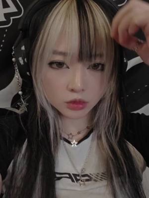 A post by @_milkbox on TikTok caption: Haven't had straight bangs since hs 😔 #acubi #bangs #skunkhair #hair #alt 