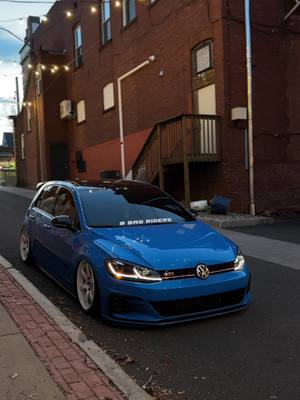 A post by @aidanquinn69 on TikTok caption: Old clips cuz i dont drive my car💀 #mk7 #gti #savethemanuals #rayswheels #cornflower #bagged #internetcar #carsoftiktok 