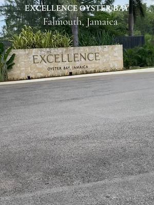 A post by @rd_eats on TikTok caption: We stayed at Excellence Oyster Bay in Falmouth, Jamaica last wekend. Y’all this was hands down the best all inclusive we’ve ever been to. 10s all across the board From the food, music, vibes, service! Do yourself a favor and book this as your next baecation. 😍🤍🇯🇲 #allinclusive #jamaica #baecation #vacation #bucketlist #luxury #excellenceoysterbay 