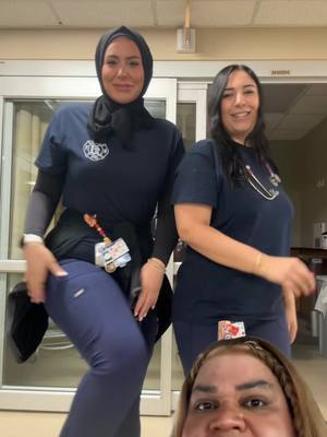 A post by @badhad96 on TikTok caption: Twinning with the twin and being demur #MemeCut #figsscrubs #figs #nurse #nursesoftiktok #fypage #fypシ゚viral #fypp #demur 