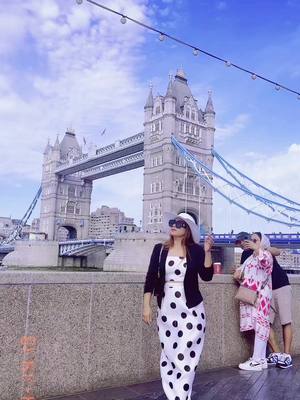 A post by @yubrani19_poon on TikTok caption: Wherever life plants you, bloom with grace 🌉🙌♥️ #yubrani19_poon #theaxeband #foryoupage #foryou #fypシ #followme #tiktokuknepal🇬🇧🇳🇵♥️ #towerbridge #londoncity #exploringtheworld #westminster #asosfashunweek #londonnightlife 🏴󠁧󠁢󠁥󠁮󠁧󠁿