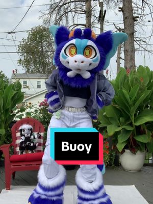 A post by @caprikki on TikTok caption: Despite all odds being against me (3 hours of sleep, no breakfast, 80° outside, big ass tail, and more), I managed to do this dance. You can definitely tell when I was starting to get tired 💀 Buoy is a commission for @buoy.bell  #fursuitdance #fursuitmaker #furryfyp #furryfandom #fursuiter #fursuit #furry #furrytiktoker #fursuitcommission 