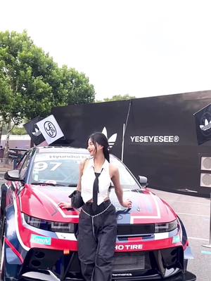 A post by @sojjing_ on TikTok caption: 🖤❤️#car #festival #peaches #아디다스 #adidas #페스티벌 #페스티벌룩 #스쿨룩 #schoollife #schoollook #fashiontiktok #fashion 