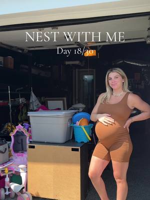 A post by @darahnycole on TikTok caption: #nestwithme day 18! One side of our garage has just been a pile of things we need to clean, organize, sell, or donate, so what perfect way to get things done as I am STILL ( 🙃 ) pregnant. PLUS IF ANYONE UNDERSTANDS HOW TO BE APPROVED FOR MUSIC WHILE HAVING A COMMERICAL ACCOUNT PLEASE LMK CAUSE SEARCHING FOR SONGS IS ANNOYING. okieeeee byeeee 