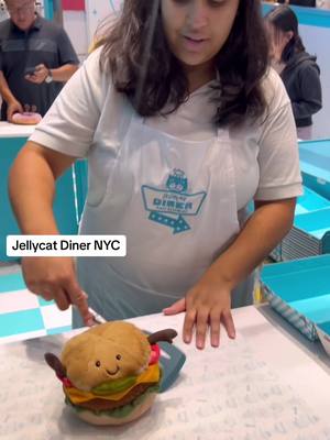 A post by @lilmisstoycollector on TikTok caption: JellyCat Diner NYC 🩵🩵@Jellycat  #jellycat #unboxing #plushies #nyc #jellycatcollection #jellycatshop #kawaii 