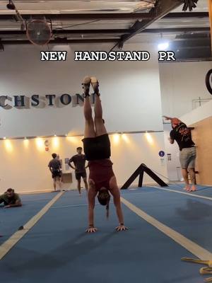 A post by @skate_a_basketball on TikTok caption: New Handstand PR Alert ‼️🙌🏼  Whohooo I held it for 14 seconds 🙌🏼🙏🏽😊 so proud of myself ! Also everyone needs a supportive friend like mine haha 🥰 Keep on being consistent and showing up for yourself and working at your goals because each day you improve and get better. I started a couple months ago not even being able to hold more than a second so this shows that if you just stick with your goal you can do anything!! 😊👏🏼🙏🏽 #handstand #handstandpractice #newpr #gymmotivation #christianfitness #fitnessmotivation #trendingreel #foryou #calisthenics