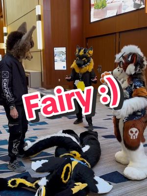 A post by @cloveruu on TikTok caption: first con tiktok with some friends featuring my new furhead as well! #furry #furries #furrymeme #furrycommunity #furryfandom #furrymemes #vrchatfurry @Reddpawz @MacNChees3 @🔥Birds🔥 