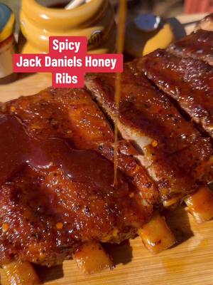 A post by @thesoulcrave on TikTok caption: Spicy Jack Daniels Honey Ribs! (Oven Baked)#Recipes #TheSoulCrave #foodcontentcreator  #DinnerIdeas #Ribs #BbqSauce 