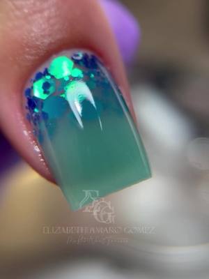 A post by @elizabethamaronails on TikTok caption: Enamorada 💙  Adoro questo effetto perché l’abbinamento delle paillettes con l’acrygel Tiffany rendono la manicure molto luminosa e delicata.  Vi piace questo effetto?      #elizabethamaronails #nailmaster  @Love Nails 