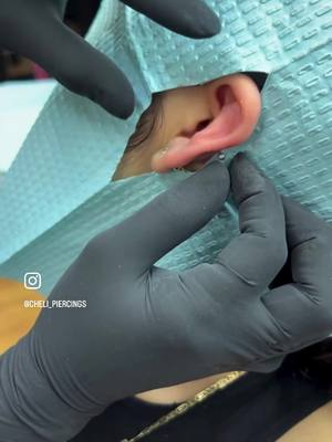 A post by @piercingsbycheli on TikTok caption: Conch piercing#conchpiercings #piercingfreak #piercingsoftiktok #fypシ゚viral #piercingideas #piercernotiktok #piercing2me #piercingjewelry #fyp #piercingsofinstagram #explore 