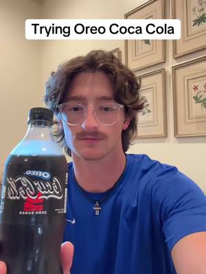 A post by @david_randall on TikTok caption: Trying the new Oreo Coca Cola. Actually quite good!! Go try it!! Got it at a gas station! #coke #oreocoke #cokeoreo #cocacola 