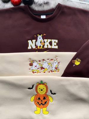 A post by @boo.hal on TikTok caption: Oh yes! Time for Spooky Season with these Pooh sweatshirts 🍯🎃 #winniethepooh #pooh #poohdisney #disney #halloween #spookyseason #fallaesthetic #matchingoutfits #matchingsweatshirts #coupleoutfit #couplesweatshirt #embroideredhoodie #embroideredsweatshirts #embroiderysmalibusiness #boohaul 