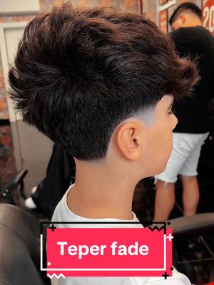 A post by @cabobarbershop on TikTok caption: #taperfade 