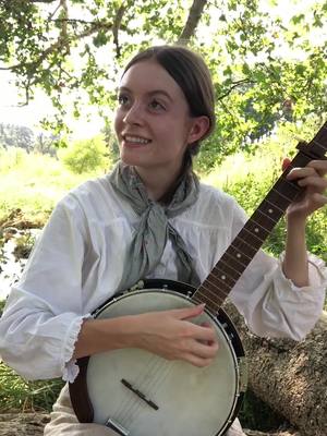 A post by @gabriellehopemusic on TikTok caption: in the pines - traditional! #folk #mountains #singer #banjo 