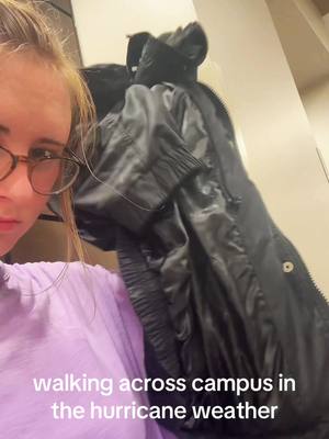 A post by @mad1gayle on TikTok caption: everything in my backpack is soaked.. rip my computer. #olemiss #dayinmylife #fyp #hurricaneseason 