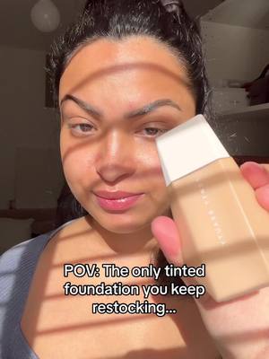 A post by @stylewithtracy on TikTok caption: Nothing beats @Fenty Beauty Ease Drop been a staple for years 💫 #tintedfoundation #fentybeauty #glowingskin 