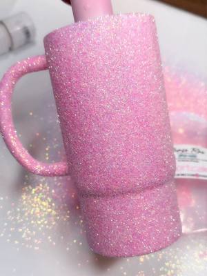 A post by @terriestumblers on TikTok caption: #Loveyourboobs #pinkglitter #pinklover #christmasmug #epoxytumbler 