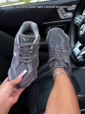 A post by @shopzakira on TikTok caption: pov: you only wear dark colored sneakers 🩶  ps: entire website will be 50% off THIS friday, get ready 🤭✨  #fyp #explore #explorepage #shoes #sneakers #gray #newbalance 