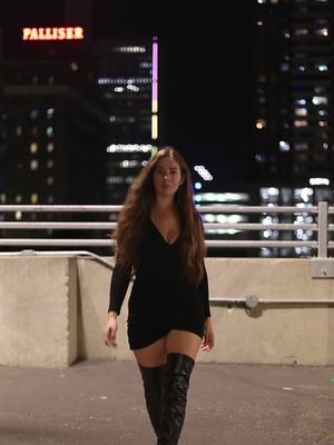 A post by @alannapearsonn on TikTok caption: City lights, street vibes, and bold looks that turn heads. Owning the night, one step at a time. 🌙✨ #Calgary #fashion #girlssupportgirls #yyc #strut #styleinspo #girlsnight 