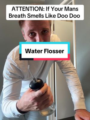 A post by @benthebulldog on TikTok caption: If your mans breath smells like camels hump watch this #teeth #badbreath #dental #dentalhygiene #waterflosser 