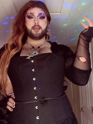 A post by @nicky_mua99 on TikTok caption: Fairy Goth Mother 🖤 #tiktok #viral #dragqueen #malemakeup #fyp #trending 