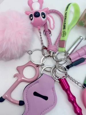 A post by @safetykeys_to on TikTok caption: ASMR Order Packing 💕💚 #safetykeychains #safetykeys 