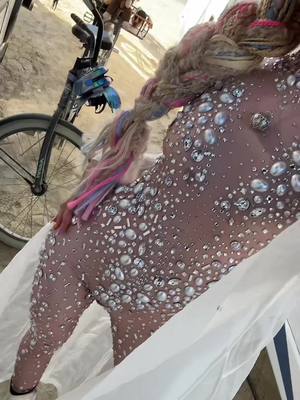 A post by @brielle.middleton on TikTok caption: Not from earth👽🪩🤍🛸 @Dreaming In Glitter #burningmanfashion #edcoutfit #ravewedding #burningmanwedding #festivaloutfitinspo 