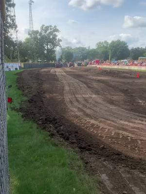 A post by @chooch_master_1466 on TikTok caption: Buddy @Aiden Voeltz taking the sled out the gate a few weeks ago at osceola! #1066 #sassyfarmtractors #fairvalleyperformance #profarmstock #atlastractor #international #freshoffthechopperbox 