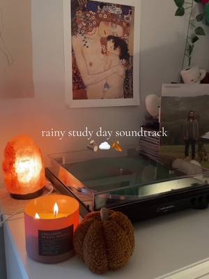 A post by @mirrorballmaya on TikTok caption: cozy study day ☁️ #studywithme #vinylrecords #vinyltok #noahkahan #stickseason #taylorswift #evermoretaylorswift #hoziertok #hozier 