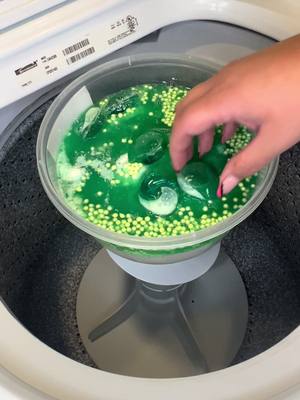 A post by @thelaundryroomasmr on TikTok caption: Gain Paste 💚 this was like frosting! 😋 #laundry #laundrytok #laundryobsession #laundryasmr #laundryoverload #asmr #overload #kenmorewasher #powderdetergent #liquiddetergent #laundrypaste #gainpods #gain #scentbeads #sudsy 