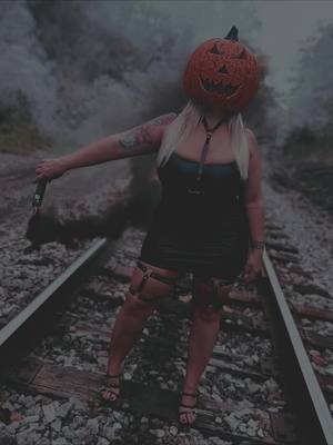 A post by @christief11 on TikTok caption: #CapCut #halloweenshoot #halloween2024 #pumpkinheadphotoshoot #sexyhalloween #halloweenphotoshoot 