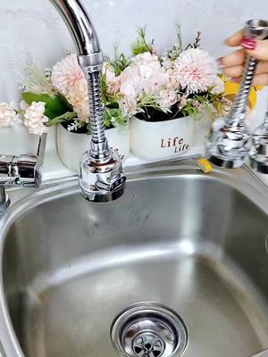 A post by @newlifehacks1_us on TikTok caption: Use this anti-splash faucet in the kitchen. It is very convenient for washing dishes and cleaning the sink. It has two water discharge modes and has a very good pressurizing effect. If you have not used it before, try it now #kitchen