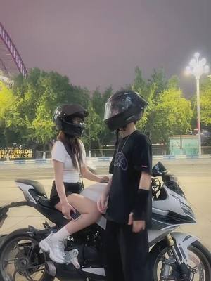 A post by @lishuxin_ on TikTok caption: he saw his chances and took it... #motogirl #lishuxin 