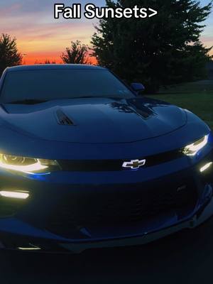 A post by @mchambo23 on TikTok caption: Fall Sunsets Are The Best #Camaro #ChevyCamaro #6thgencamaro #camaross #camarov8 #americanmusclecar #fall #halloween #like #comment #fyp #october 