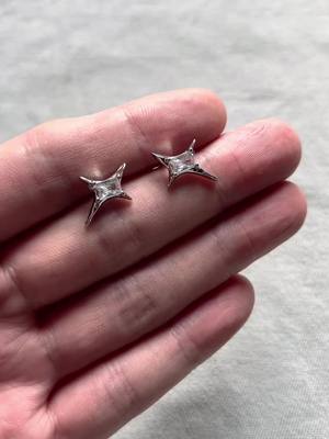 A post by @qi_qcs on TikTok caption: CZ star stud earrings for men and women,Get ready to make your ears sparkle✨🤩#earrings #studearrings #men #women #unisex 