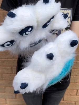 A post by @mysticthetragolf on TikTok caption: The paws are now done! #furry #furryfandom #commission #SmallBusiness #furrytiktok #fursuit #fursuitmaker 