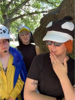 A post by @greyne on TikTok caption: Aw come onnn 😭 . Law: @Grae  Penguin: @ millpill . . #onepiece #onepiececosplay #trafalgarlaw #lawcosplay #heartpirates #heartpiratescosplay #shachicosplay #penguinonepiece 