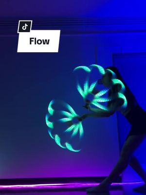 A post by @xaunara on TikTok caption: Guys, I didnt try hip reels for a while and today it just CLICKED?! So happy to add another move to the books 🙏🥰 #flowarts #flowartist #neoflowartfans #sevenlions #edmcommunity #plur #lightshow 